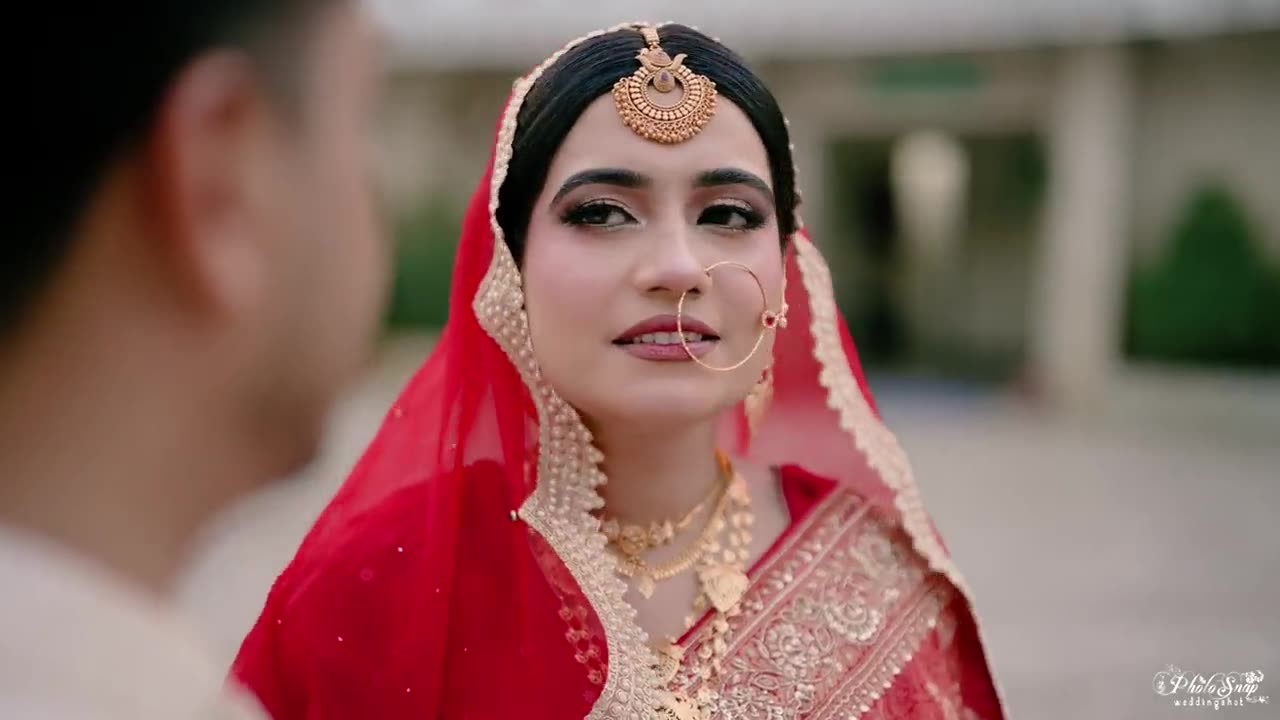 Bridal portrait in a red saree - wedding album